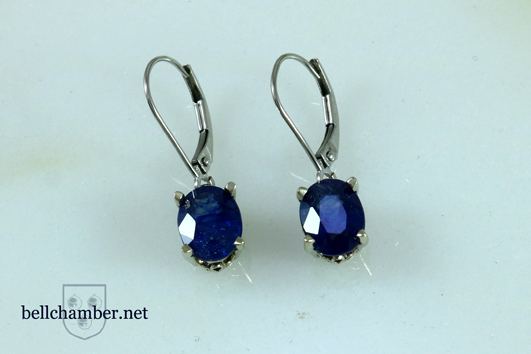 Oval sapphire earrings in white gold 4 claw settings