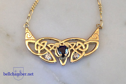 Celtic Crescent Triskele pendant with diamonds and sapphire