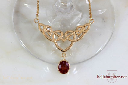 Faith's Heart - gold Celtic pendant with 2.5ct raspberry red sapphire