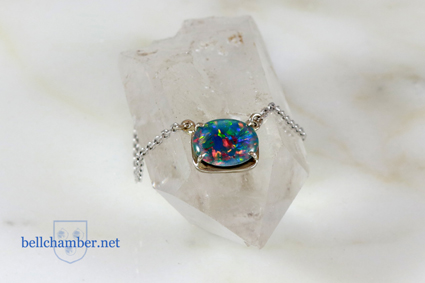 Claw set Opal in White Gold setting