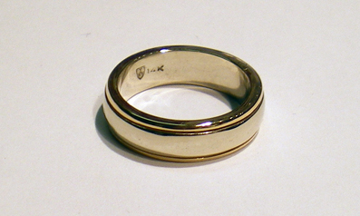 White Gold Wedding Ring with Yellow Gold edges.