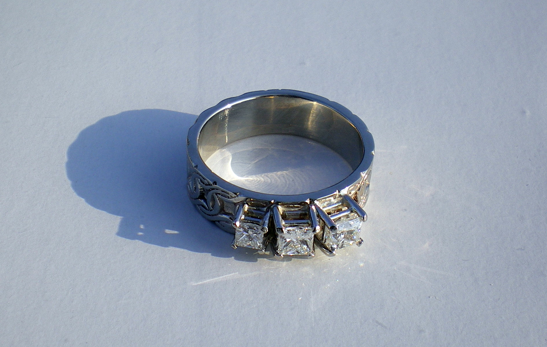 White Gold Celtic Ring with Princess Cut Diamonds