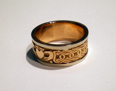 The left side of the Doyle Claddagh in Rose Gold with White Gold edges.