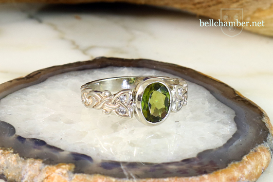 White Gold Celtic Ring with diamonds and peridot